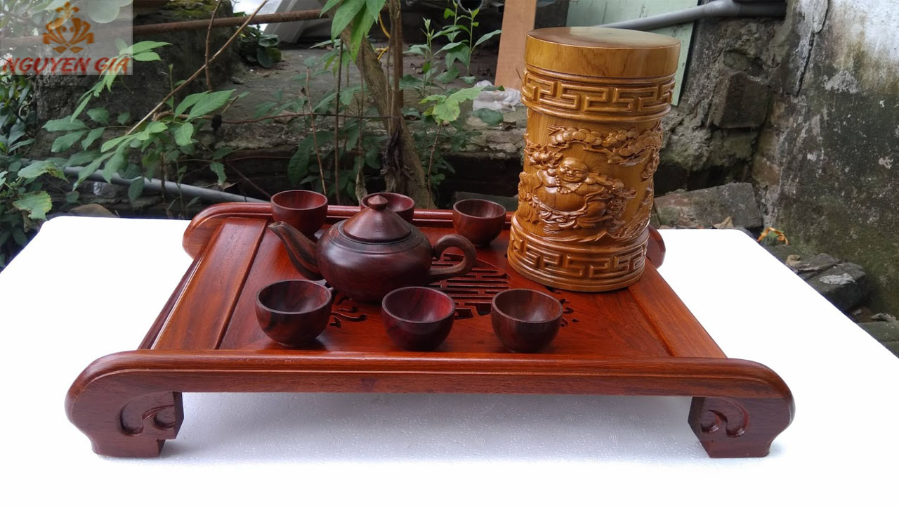 Bộ ấm trà bằng gỗ trắc nguyên khối