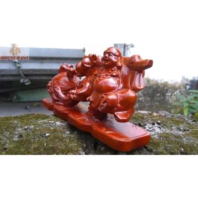 Tượng di lặc kéo bao tiền bằng gỗ hương