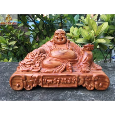 Tượng Di Lặc vạn sự như ý gỗ Huyết Long để ô tô bàn làm việc
