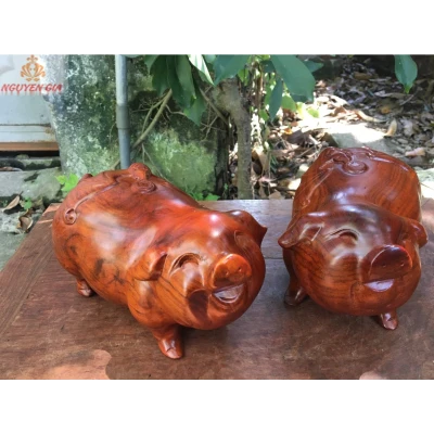 Tượng đôi heo phong thủy bằng gỗ Hương