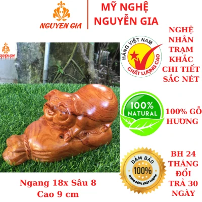 Tượng heo phong thủy nằm bao tiền bằng gỗ Hương