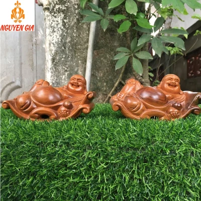 Tượng Di Lặc nằm thảnh thơi bằng gỗ bách xanh để ô tô bàn làm việc