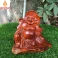 Tượng Di Lặc ngồi tựa lá sen cầm bao tiền Gỗ Hương Cao 17 ngang 20 sâu 8,5cm